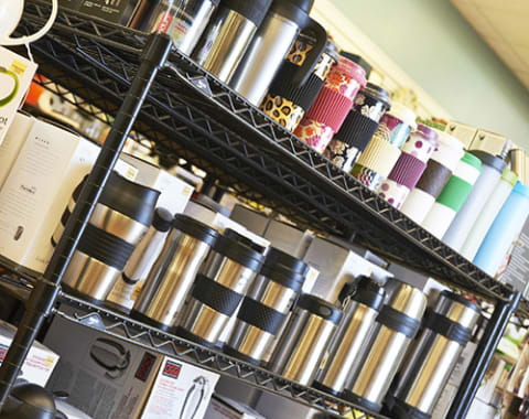 Using Wire Shelving vs Louvered Panels to Organize Storage Bins